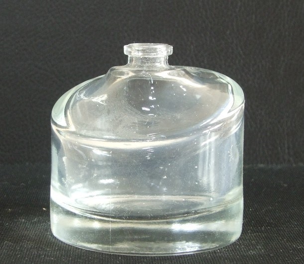 Glass and Empty Perfume Bottle Can Produce