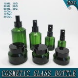 Green Cylinder Cosmetic Glass Bottle and Black Cap Glass Cream Jar