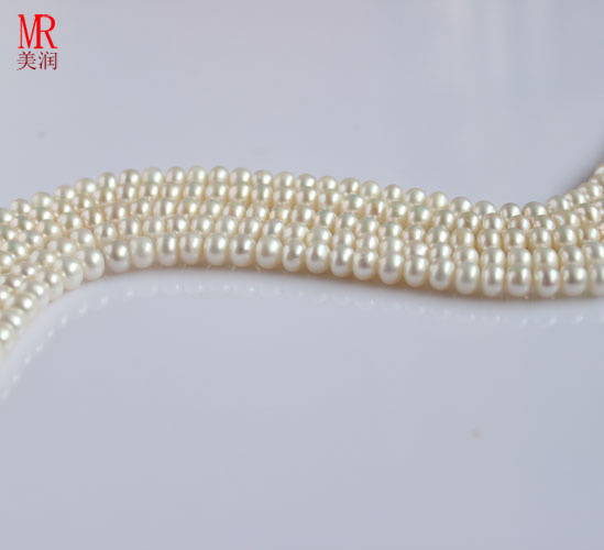 7-8mm White Freshwater Pearl Strand, Button Round (ES119)