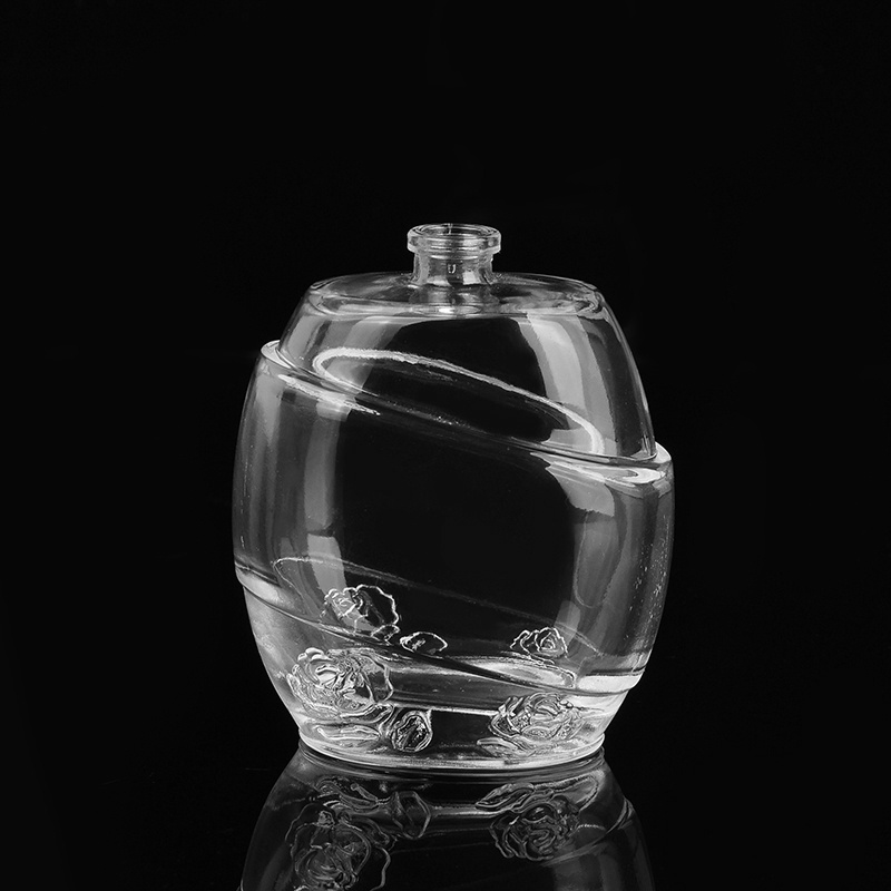 100ml Crystal Empty Glass Perfume Bottle with Embossed Flower and Laser Logo