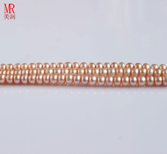 6-7mm Pink Freshwater Pearl Strand, Button Round (ES126)