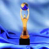 Holding up The Earth Shaped Glass Trophy Greenest Car Award Weightlifting Competition Award Environmental Protection Prizes