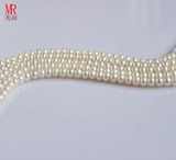 7-8mm White Freshwater Pearl Strand, Button Round (ES119)